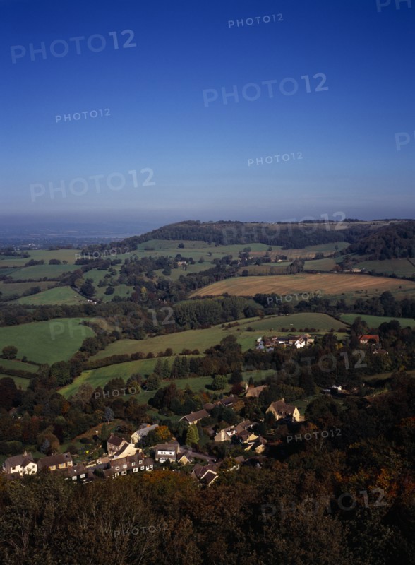England, Gloucestershire, South Cotswolds, View west from Tyndale Monument over the village of North Nibley and surrounding landscape.. Photo : Bryan Pickering