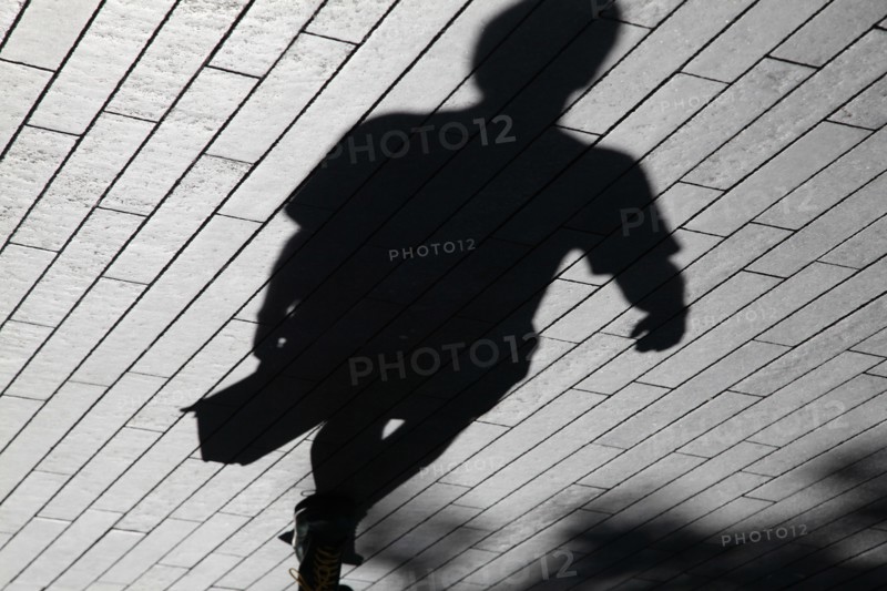 England, London, Southwark Shadows of commuters. Photo : Sean Aidan