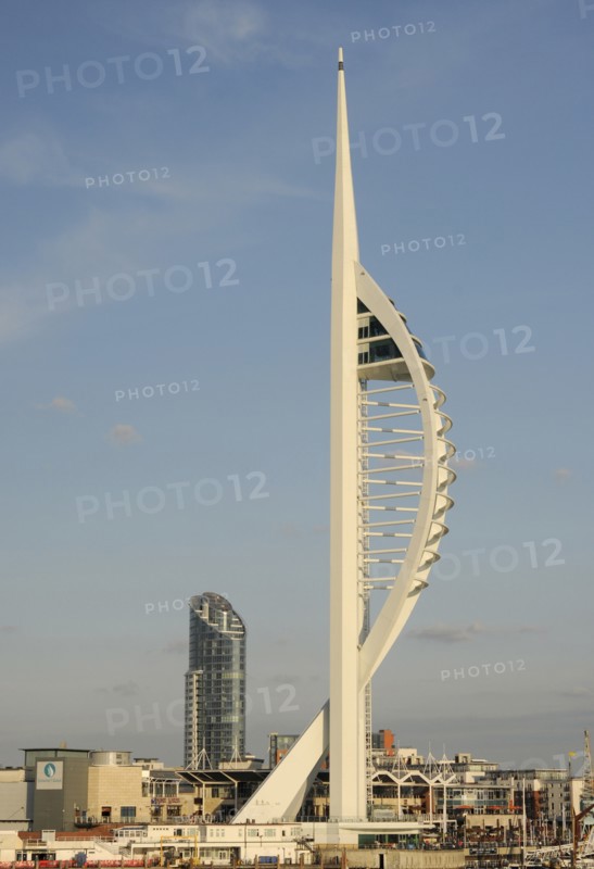 England, Hampshire, Portsmouth, Spinnaker Tower and Gunwharf Quay shopping center seen from the harbour. Photo : Bob Battersby