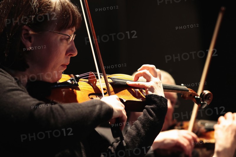 Music, Instruments, Strings, Violin Detail of woman playing in orchestra. Photo : Sean Aidan