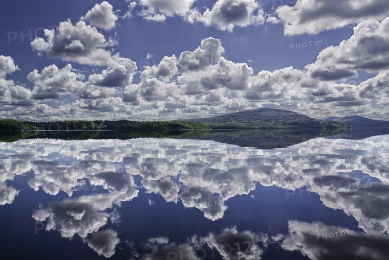 Ireland, County Sligo, Lough Gill , Calm reflection of clouds in the water. Photo : Hugh Rooney