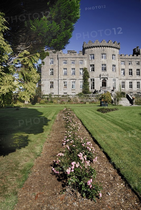 Ireland, County Sligo, Markree, Castle hotel view of a section of the castle with row of flowers in the foreground. Photo : Hugh Rooney