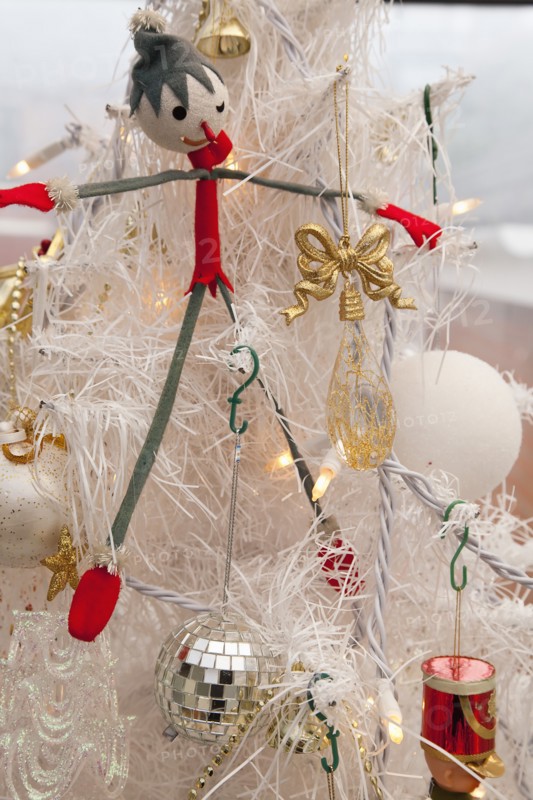 Festivals, Religious, Christmas, Detail of tree decorated with lights tinsel and various baubles. Photo : Stephen Rafferty
