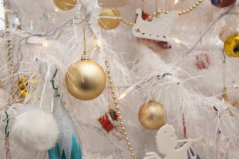 Festivals, Religious, Christmas, Detail of tree decorated with lights tinsel and various baubles. Photo : Stephen Rafferty