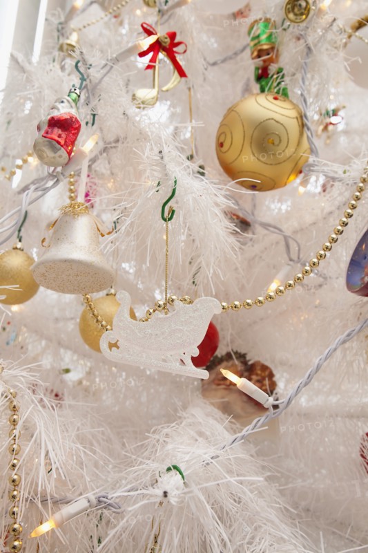 Festivals, Religious, Christmas, Detail of tree decorated with lights tinsel and various baubles. Photo : Stephen Rafferty
