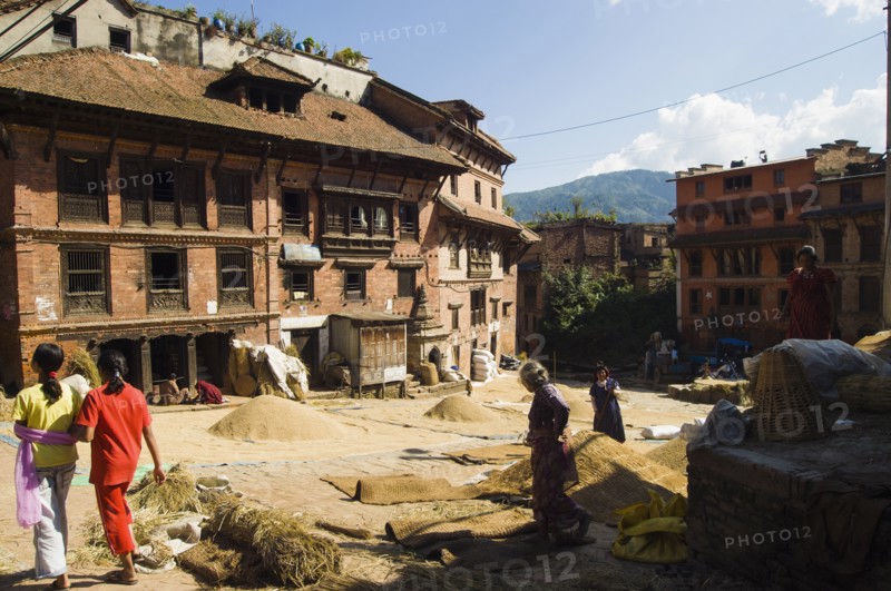 Nepal, Bhaktapur, Grain drying in sun. 
Photo Nic I Anson / Eye Ubiquitous