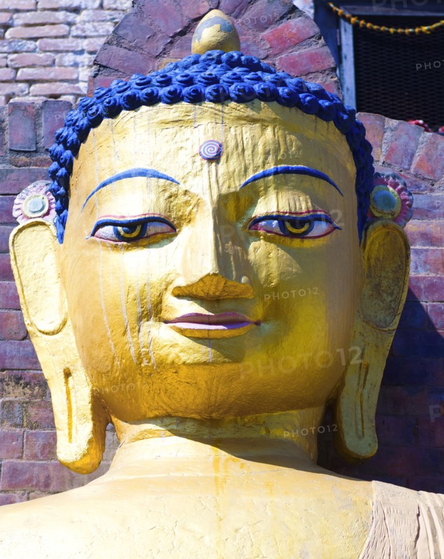 Nepal, Kathmandu, Beautiful golden Buddha head statue at theSwayambunath Monkey Temple. 
Photo Nic I Anson / Eye Ubiquitous