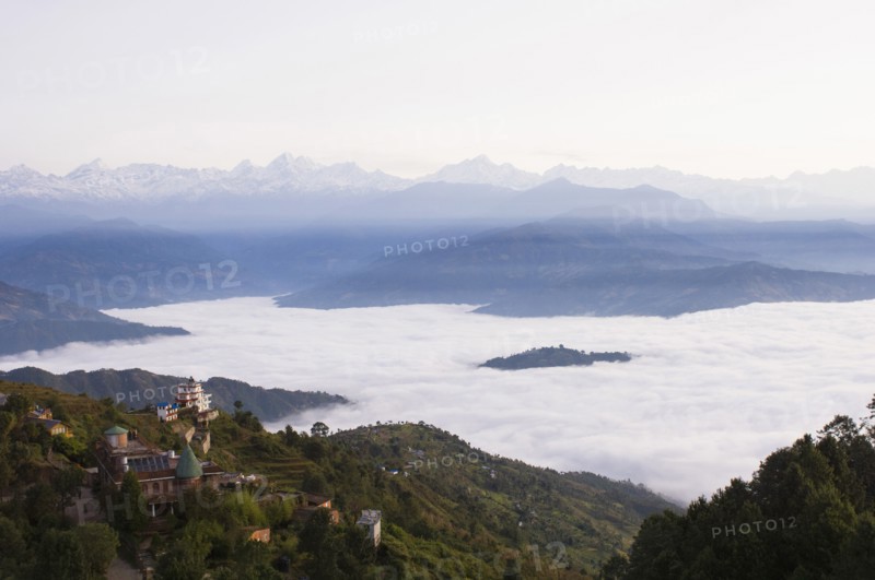 Nepal, Nagarkot, View across clouded valley towards Himalayan mountains. 
Photo Nic I Anson / Eye Ubiquitous