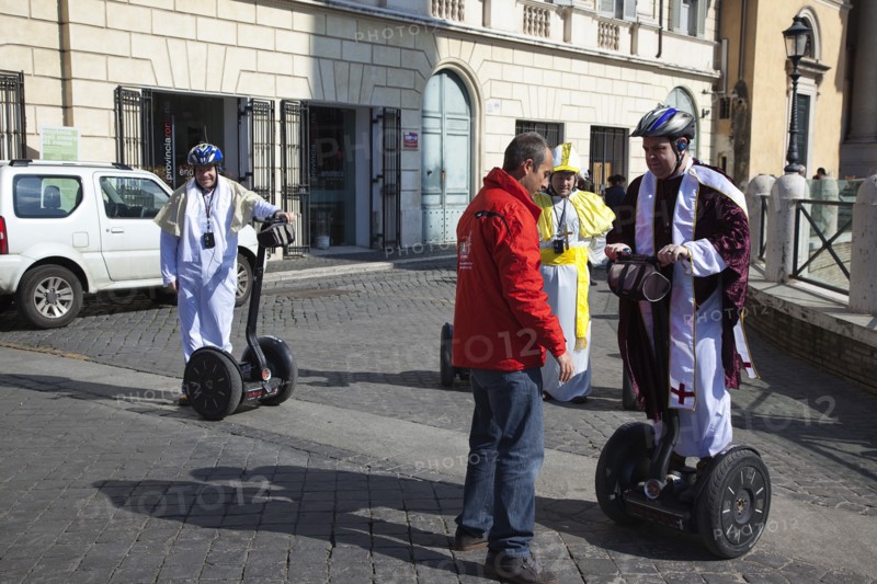Italy, Lazio, Rome, Tourists dressed as Bishops to take tour on Segways. 
Photo Stephen Rafferty / Eye Ubiquitous