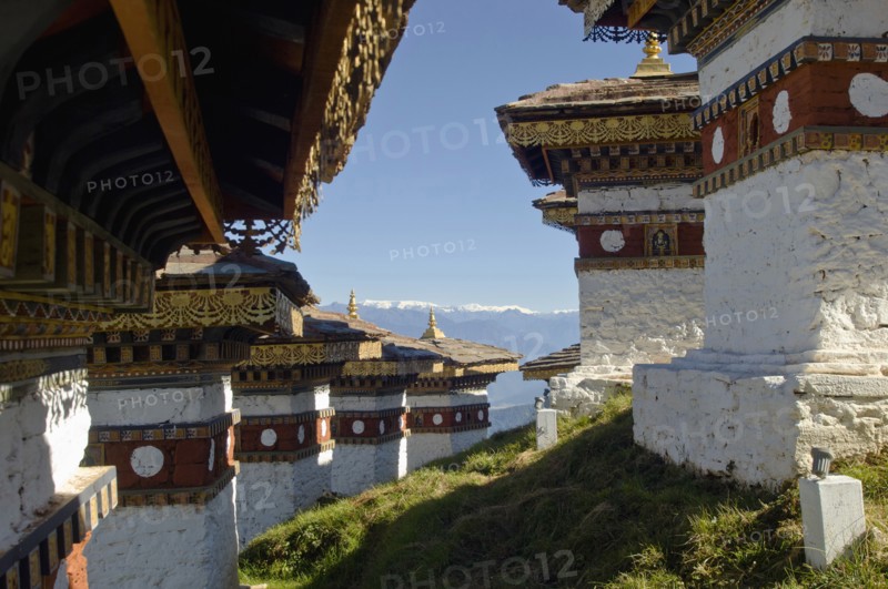 Bhutan, Dochu La, Chortens to commemorate victory of the 4th King in battle near Thimphu. 
Photo Nic I'Anson