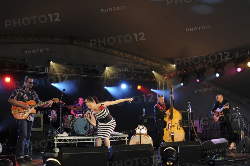 Music, Strings, Guitars, Irish Rockabilly singer Imelda May and her band performing at the 2010 Cornbury Festival.
