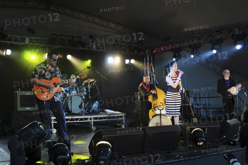 Music, Strings, Guitars, Irish Rockabilly singer Imelda May and her band performing at the 2010 Cornbury Festival. 
Photo Bob Battersby