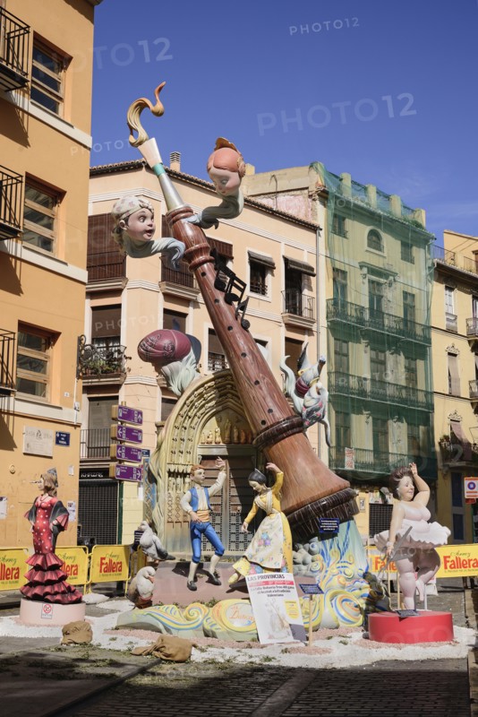 Spain, Valencia Province, Valencia, Falla scene with Papier Mache figures in the streets of the Carmen district during Las Fallas festival. 
Photo Hugh Rooney