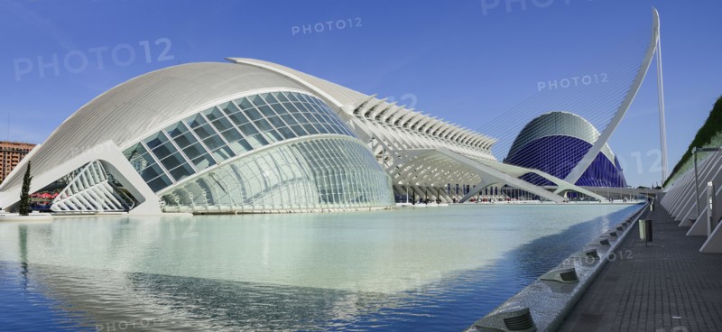 Spain, Valencia Province, Valencia, Spain, Valencia Province, Valencia, La Ciudad de las Artes y las Ciencias, City of Arts and Sciences, L'Hemisferic, Principe Felipe Science Museum, El Pont de l'Assut de l'Or Bridge and Agora. 
Photo Hugh Rooney