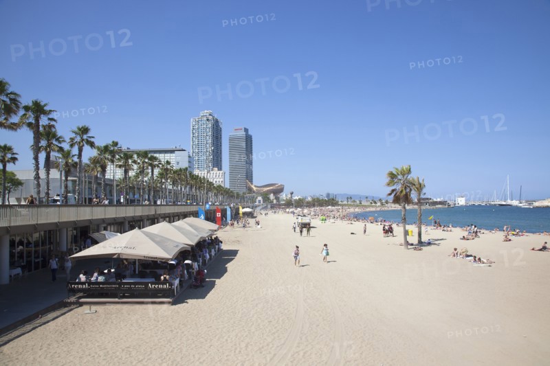 Spain, Catalonia, Barcelona, Barceloneta  Playa de St Sebastia  view along beach toward Port Olimpic.