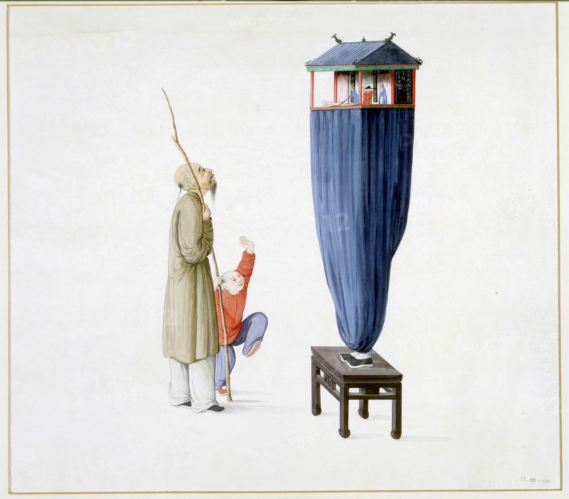 Homme à l'intérieur d'un théâtre-marionnette