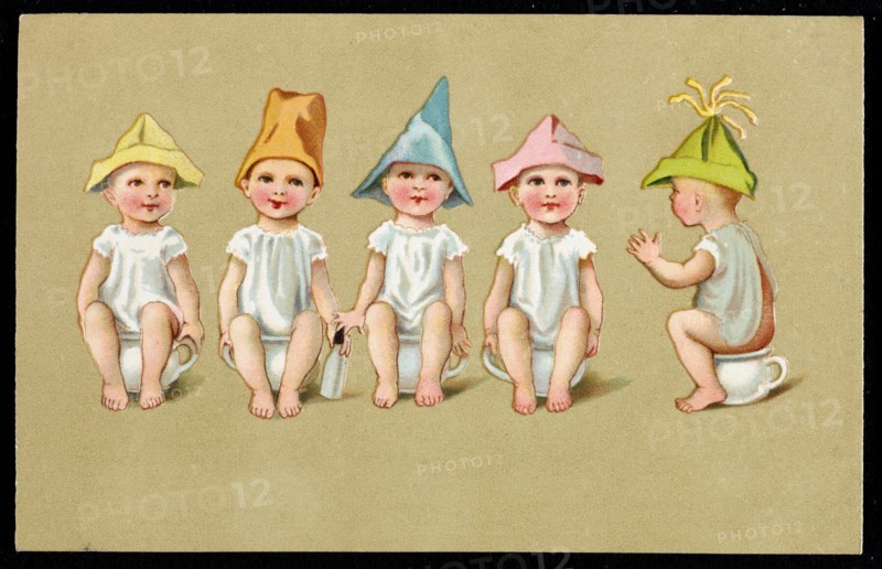 Bébés assis sur des pots de chambre