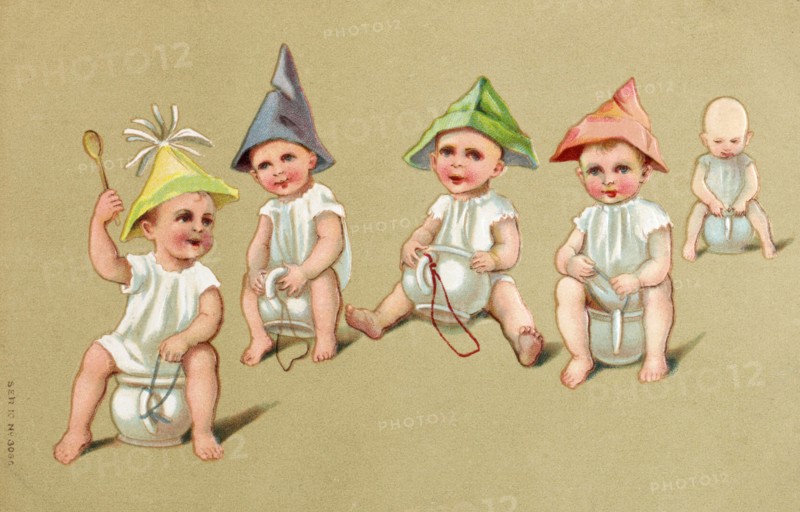 Bébés assis sur des pots de chambre