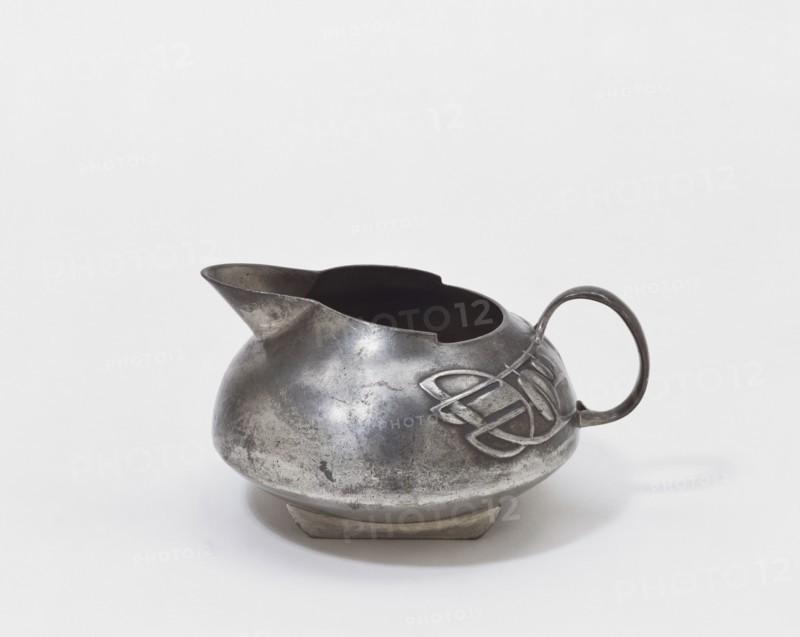 Pewter Tudric Milk Jug, by Archibald Knox. London, England, early 20th century