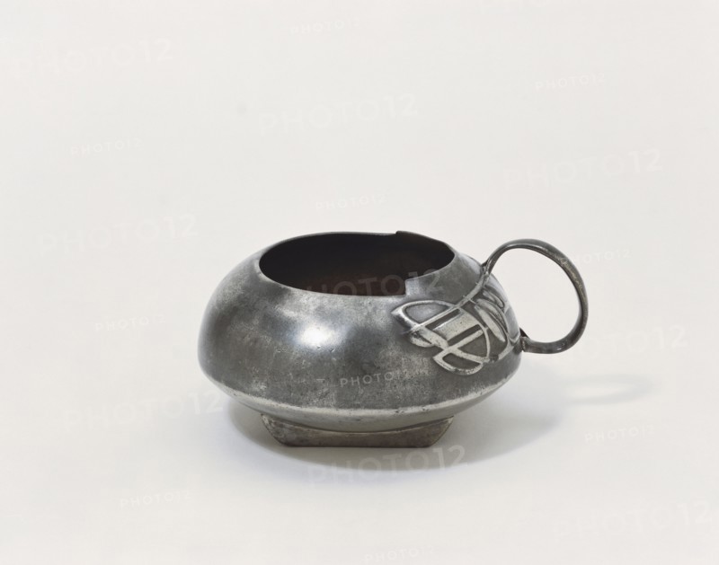 Pewter Tudric Milk Jug, by Archibald Knox. London, England, early 20th century