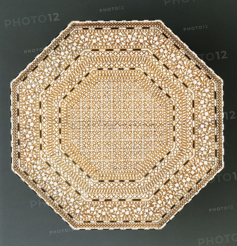 Small table, octagonal top with eight legs. India, 1881