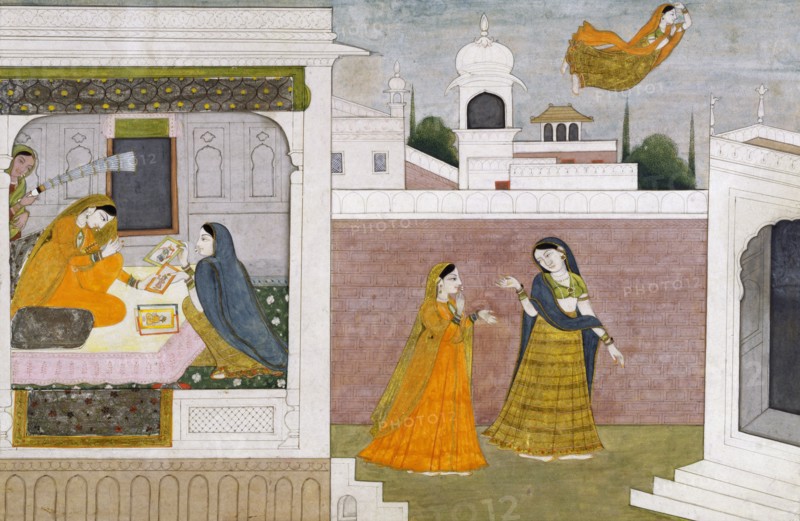 Usha looking at portraits. Kangra, India, early 19th century
