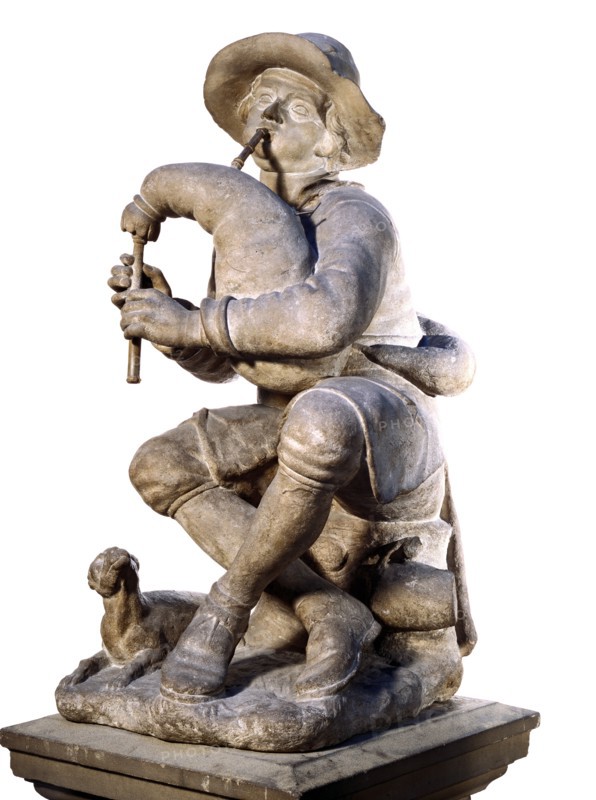 Boy playing the bagpipes, by Caius Gabriel Cibber. England, late 17th century