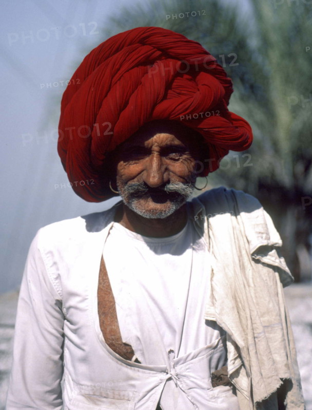 Rajasthani shepherd on the road to Bambora, India