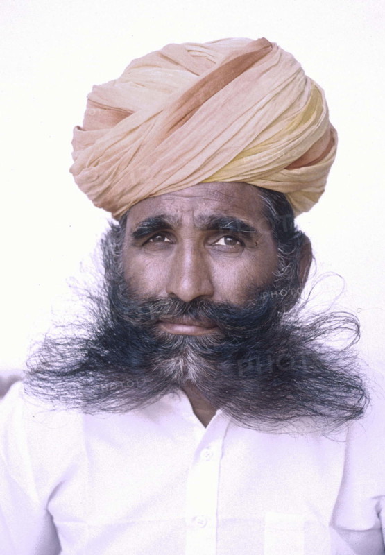 Portrait of Indian man inside the Amber Fort,
Jaipur, Eastern Rajasthan, India.