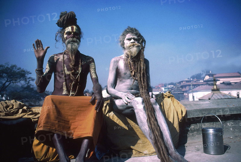 Sadhus near the cremation ghats on the Vishnumati River in the Khatmandu Valley, Nepal, India.