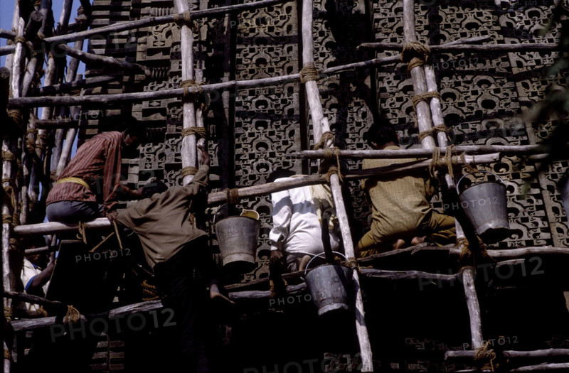 Restoration and cleaning of Adinatha Temple walls, Khajuraho, India