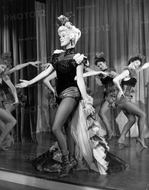 Film still of Jayne Mansfield on stage in The Sheriff of Fractured Jaw