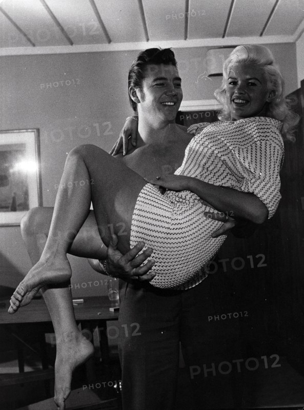 Jayne Mansfield being carried by her husband