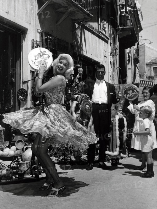 Jayne Mansfield dancing with a tambourine