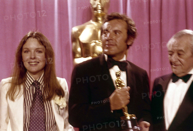 March 29, 1976, Los Angeles, California, USA: Actress DIANE KEATON at the Oscars in 1976 with MILOS FORMAN (C) with his Oscar for Best Director for One Flew Over the Cuckoo's Nest. (Credit Image: © Globe Photos/ZUMA Wire)