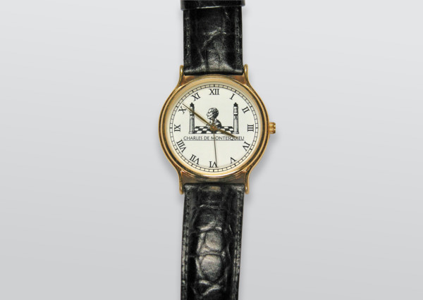 Circular watch on a strap.