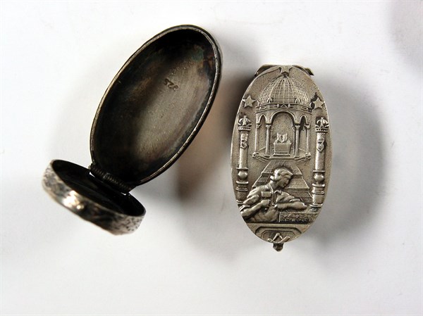 Silver pillbox with Masonic motifs.