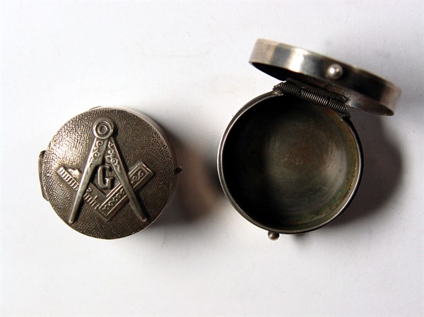Silver pillbox with Masonic motifs.