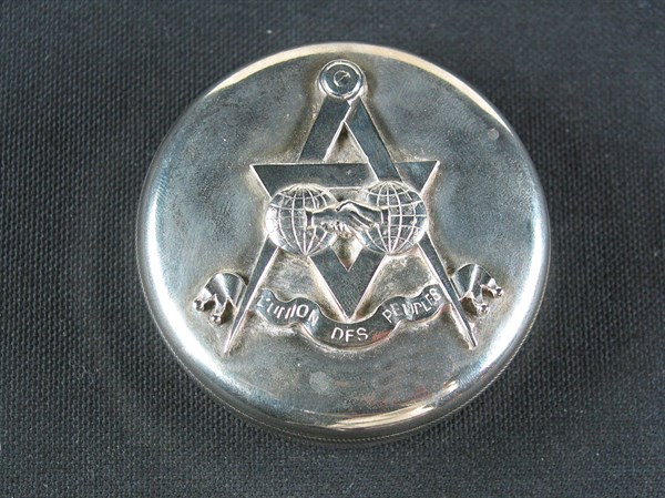 Silver-plated metal case.