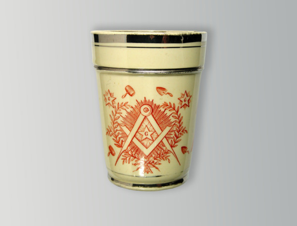 Faience beaker.