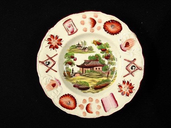 Saucer with Chinese and Masonic motifs.