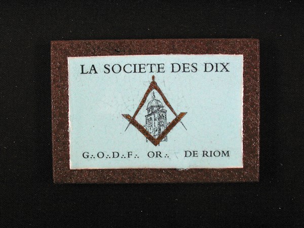 Inlaid ceramic plaque