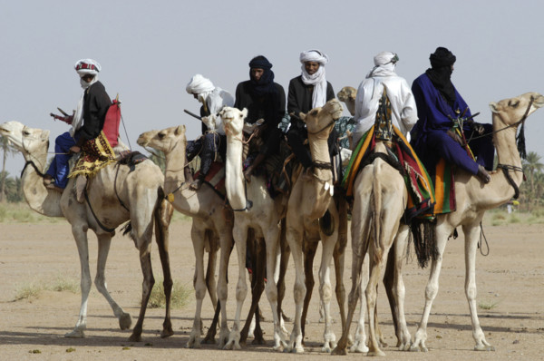 Nomads are seen on camels at the Salt Cure festival drawing nomads from all over the region to