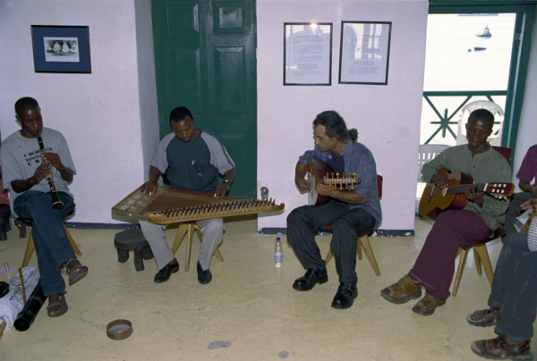 A Taarab orchestra plays in the Cultural Music Club in Stone Town, Zanzibar. It is difficult to