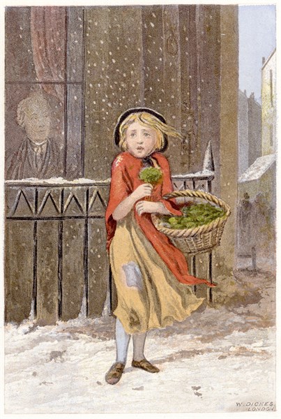 Young girl in rags and wearing a shawl
