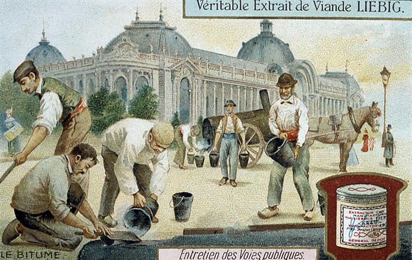 Laying bitumen road surface in a Paris street