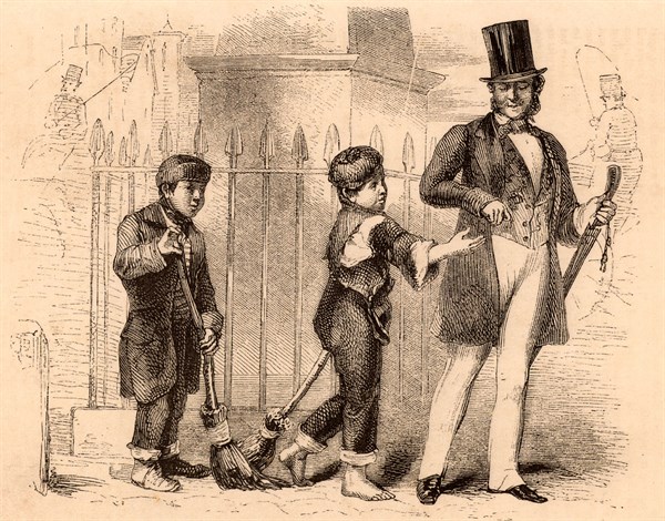 Boy crossing sweepers