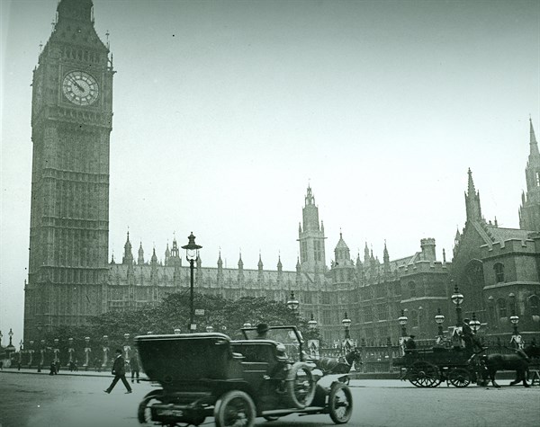 Parliament Square, London, c1906, showing early electric lamps, an automobile