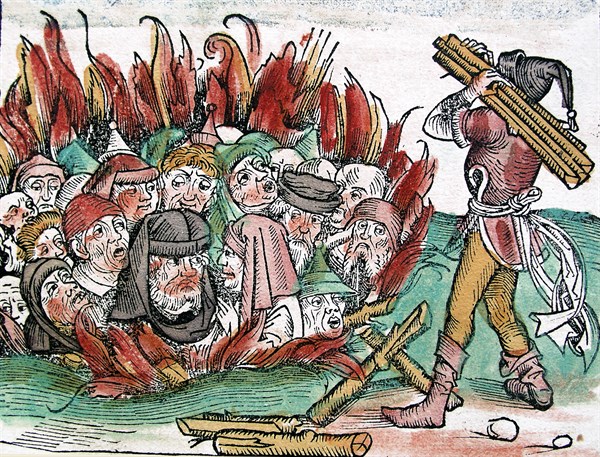 The burning of Jews in germany shown in a coloured woodblock illustration from Liber Chronicarum
