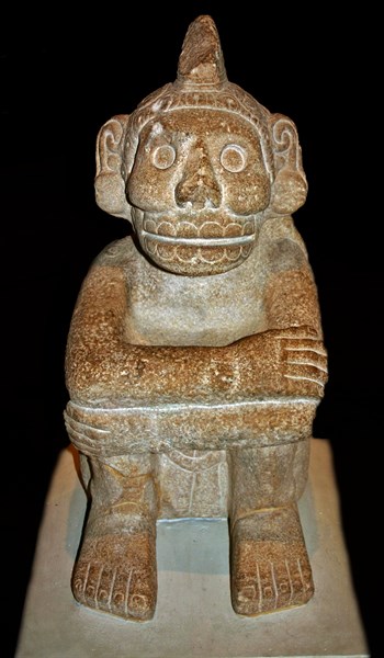 Stone seated figure of Xochipilli